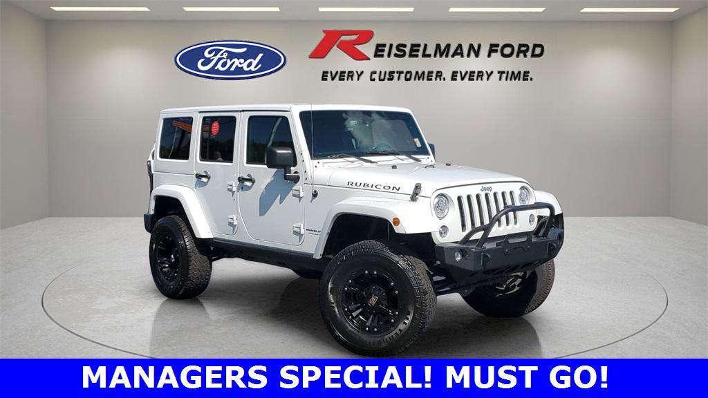 used 2018 Jeep Wrangler JK Unlimited car, priced at $21,593