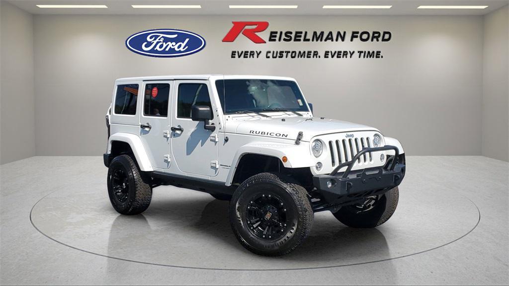 used 2018 Jeep Wrangler JK Unlimited car, priced at $23,381