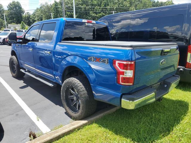 used 2018 Ford F-150 car, priced at $23,390