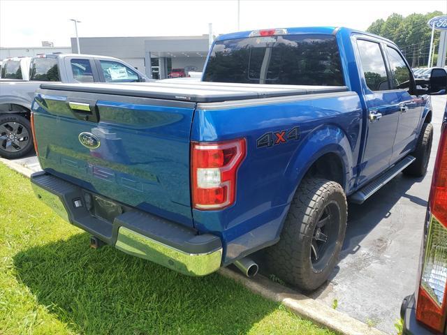 used 2018 Ford F-150 car, priced at $23,390