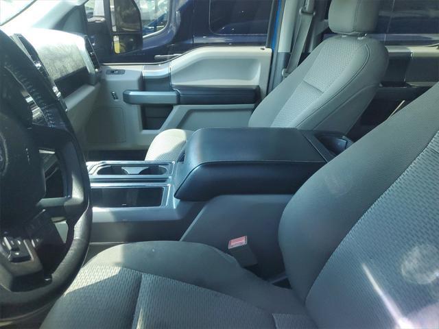 used 2018 Ford F-150 car, priced at $23,390