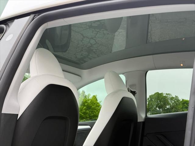 used 2024 Tesla Model Y car, priced at $35,995