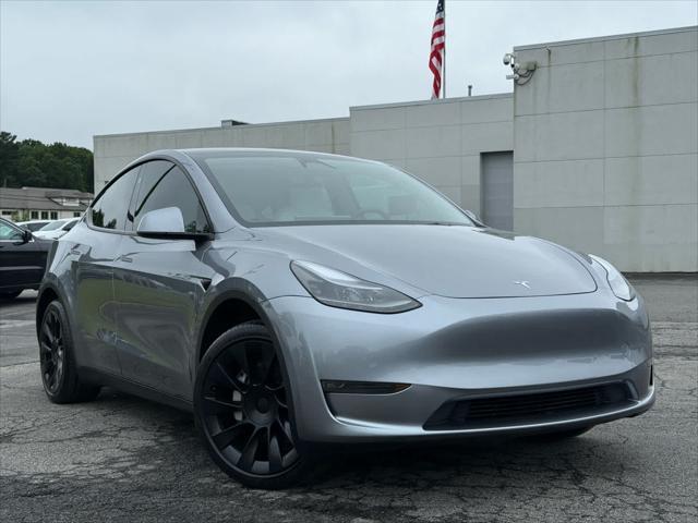 used 2024 Tesla Model Y car, priced at $35,995