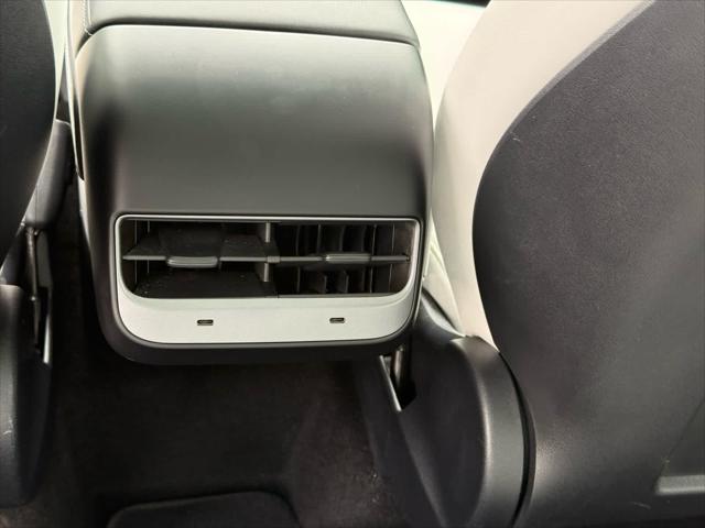 used 2024 Tesla Model Y car, priced at $35,995