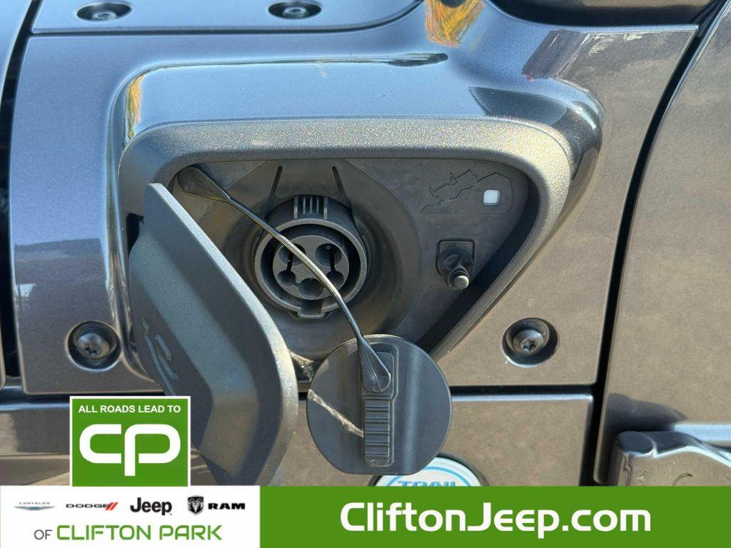 used 2022 Jeep Wrangler Unlimited 4xe car, priced at $33,176