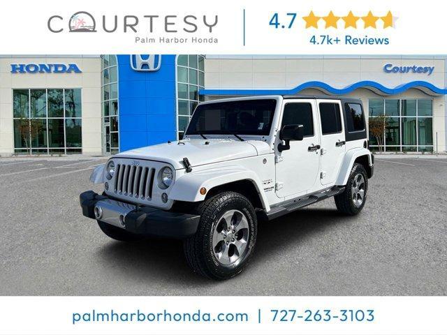 used 2016 Jeep Wrangler Unlimited car, priced at $22,141