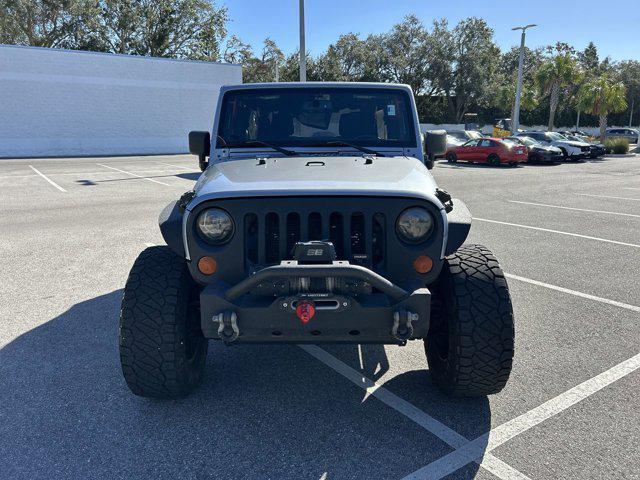 used 2014 Jeep Wrangler Unlimited car, priced at $16,152