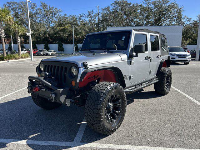 used 2014 Jeep Wrangler Unlimited car, priced at $16,152