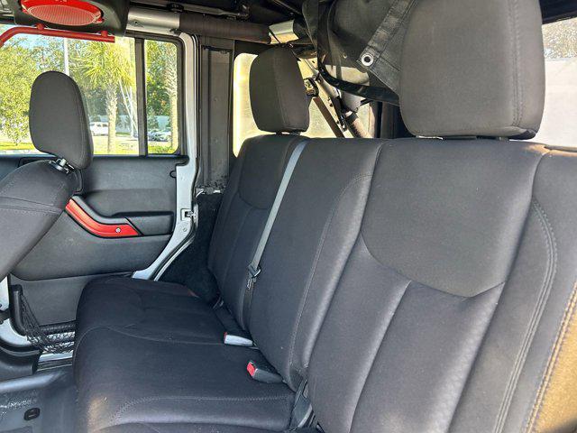 used 2014 Jeep Wrangler Unlimited car, priced at $16,152