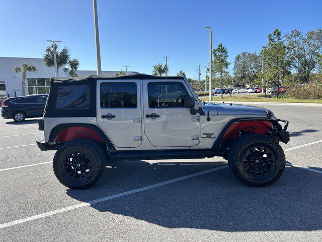 used 2014 Jeep Wrangler Unlimited car, priced at $16,152