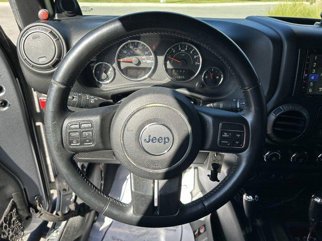 used 2014 Jeep Wrangler Unlimited car, priced at $16,152