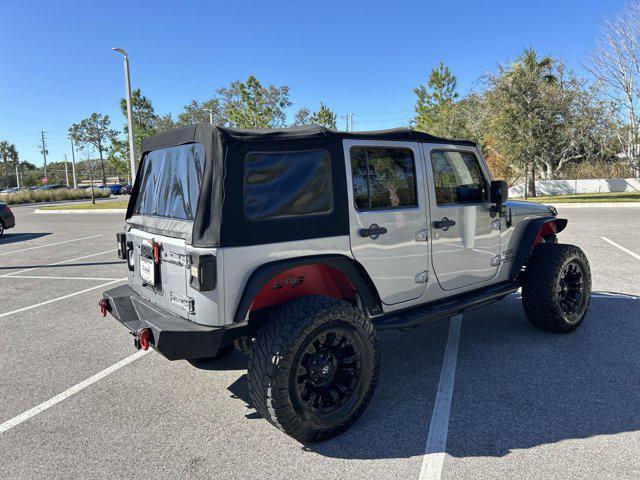 used 2014 Jeep Wrangler Unlimited car, priced at $16,152