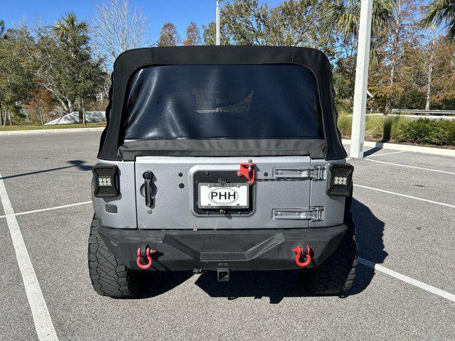 used 2014 Jeep Wrangler Unlimited car, priced at $16,152