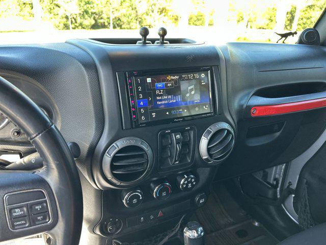 used 2014 Jeep Wrangler Unlimited car, priced at $16,152