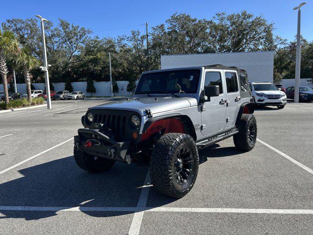 used 2014 Jeep Wrangler Unlimited car, priced at $16,152