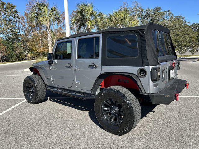 used 2014 Jeep Wrangler Unlimited car, priced at $16,152