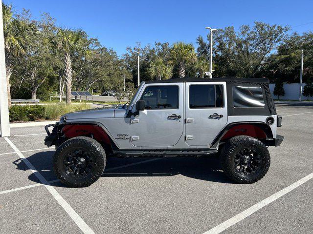 used 2014 Jeep Wrangler Unlimited car, priced at $16,152