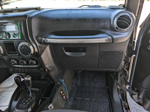 used 2015 Jeep Wrangler car, priced at $17,452