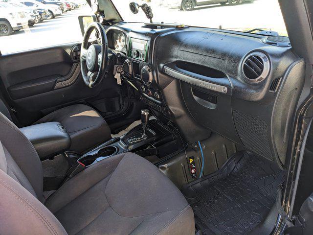used 2015 Jeep Wrangler car, priced at $17,452