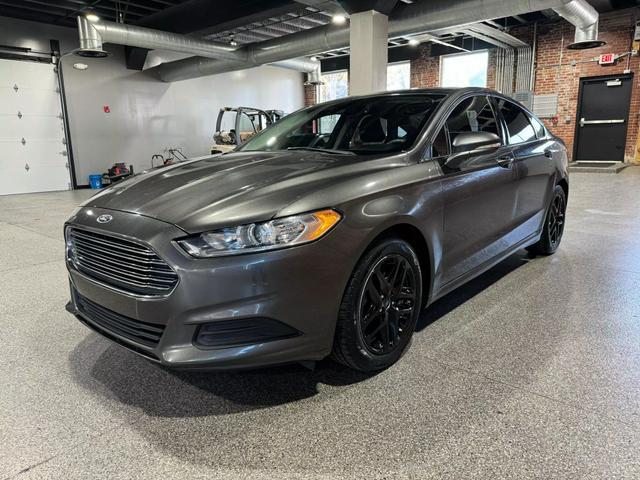 used 2016 Ford Fusion car, priced at $12,900