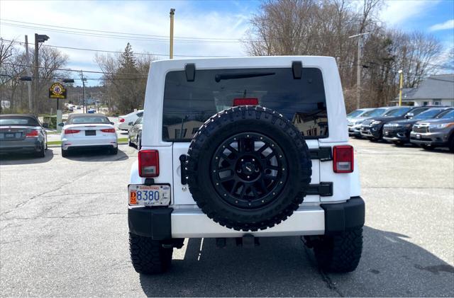 used 2014 Jeep Wrangler Unlimited car, priced at $22,990