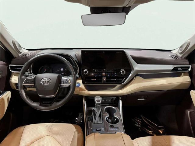 used 2021 Toyota Highlander Hybrid car, priced at $48,099