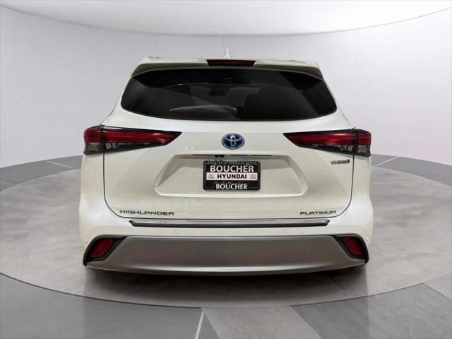 used 2021 Toyota Highlander Hybrid car, priced at $48,099