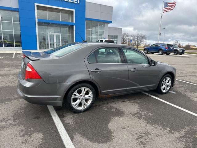 used 2012 Ford Fusion car, priced at $5,000