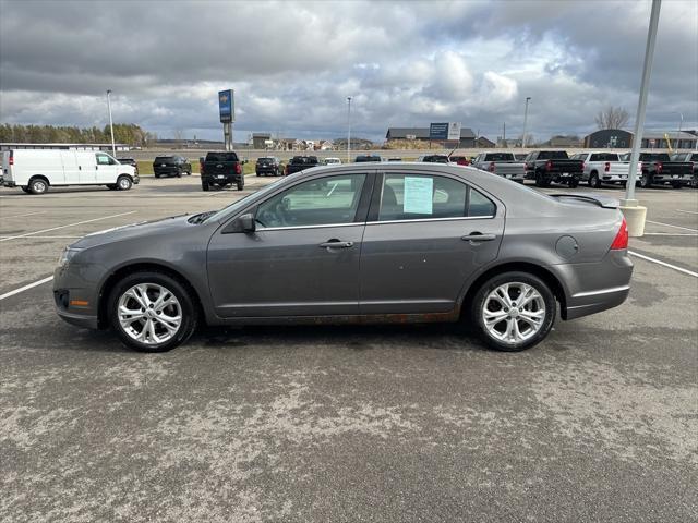 used 2012 Ford Fusion car, priced at $5,000