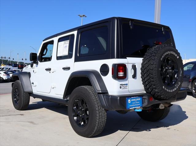 used 2023 Jeep Wrangler 4xe car, priced at $28,856