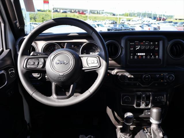 used 2023 Jeep Wrangler 4xe car, priced at $28,856