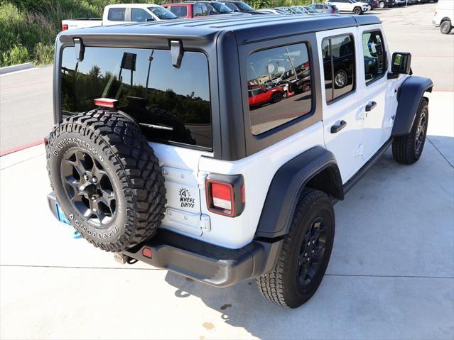used 2023 Jeep Wrangler 4xe car, priced at $28,856