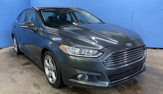 used 2015 Ford Fusion car, priced at $7,839