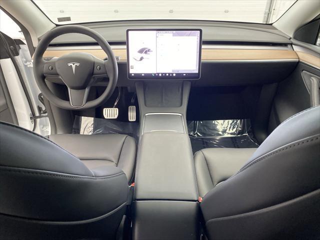 used 2025 Tesla Model Y car, priced at $42,499