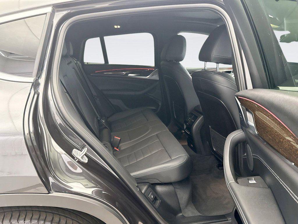 used 2023 BMW X4 car, priced at $38,996