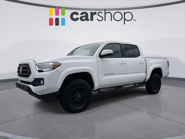 used 2022 Toyota Tacoma car, priced at $26,196