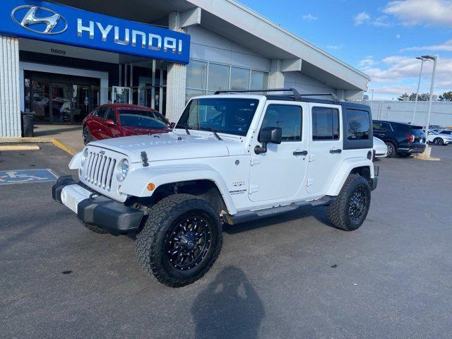 used 2016 Jeep Wrangler Unlimited car, priced at $21,959