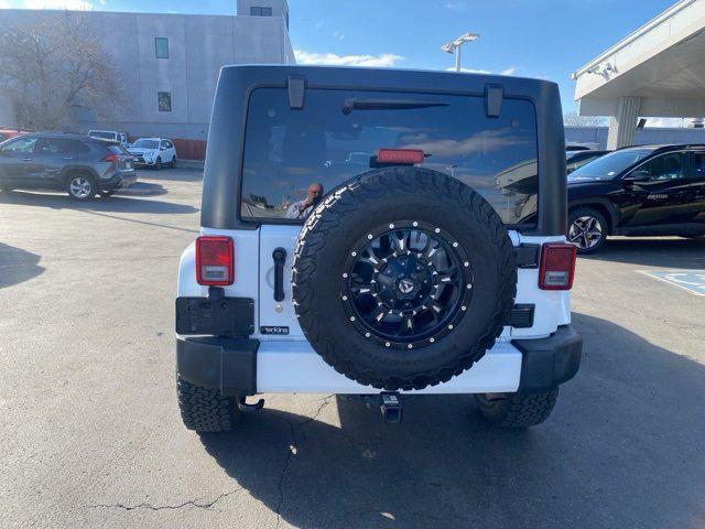 used 2016 Jeep Wrangler Unlimited car, priced at $21,959