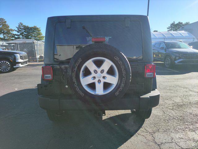 used 2014 Jeep Wrangler Unlimited car, priced at $16,870