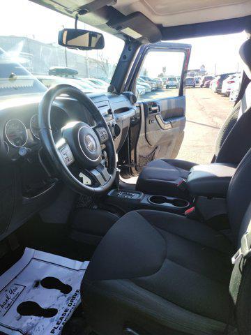used 2014 Jeep Wrangler Unlimited car, priced at $16,870