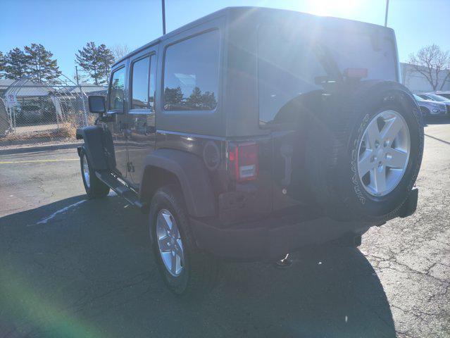 used 2014 Jeep Wrangler Unlimited car, priced at $16,870