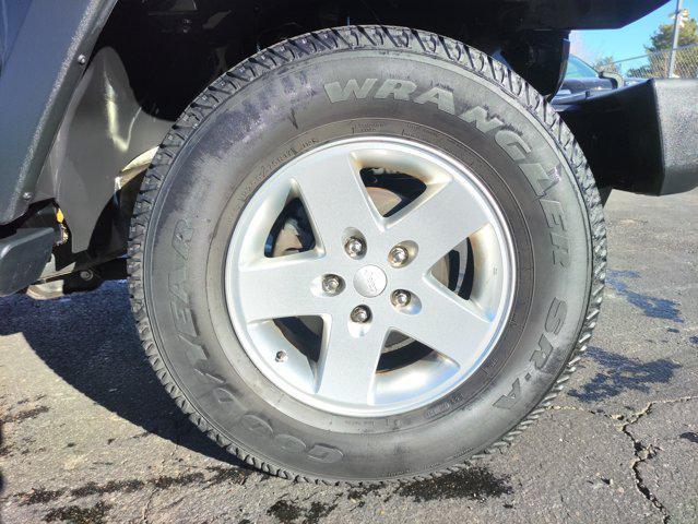 used 2014 Jeep Wrangler Unlimited car, priced at $16,870