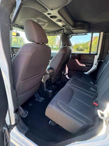 used 2015 Jeep Wrangler Unlimited car, priced at $16,897