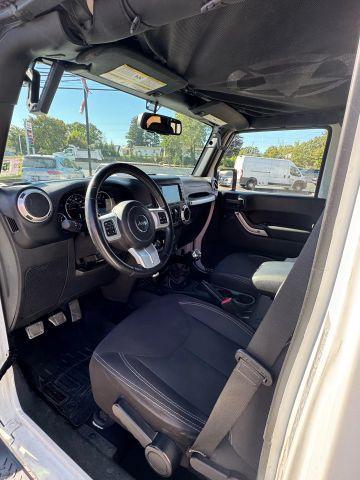 used 2015 Jeep Wrangler Unlimited car, priced at $16,897