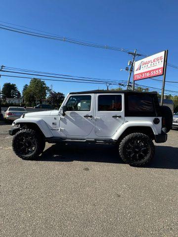 used 2015 Jeep Wrangler Unlimited car, priced at $16,897