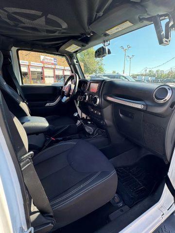 used 2015 Jeep Wrangler Unlimited car, priced at $16,897
