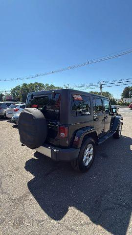 used 2015 Jeep Wrangler Unlimited car, priced at $11,477