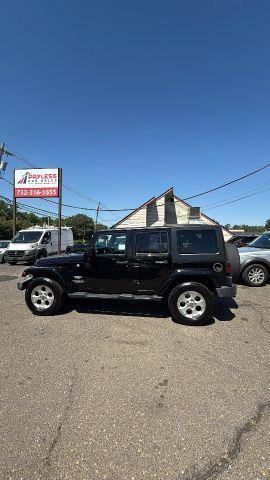 used 2015 Jeep Wrangler Unlimited car, priced at $11,477