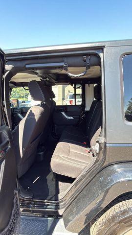 used 2015 Jeep Wrangler Unlimited car, priced at $11,477