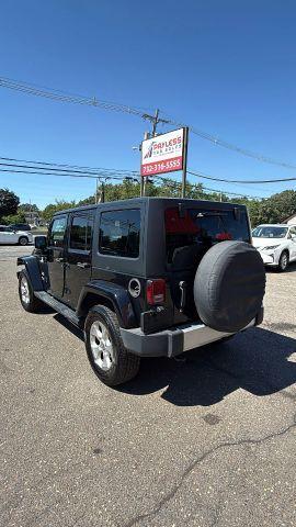 used 2015 Jeep Wrangler Unlimited car, priced at $11,477